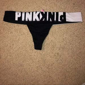 Pink black and white thong